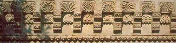 Decorations cut from the 200 year old facade of the house
